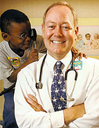 Dr Brent and a young boy patient